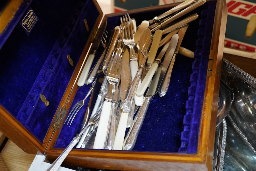 A quantity of silver plate to include cutlery, dishes, a wine coaster, etc. Condition - varies, poor to fair